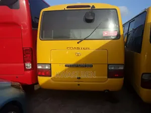 Toyota Coaster 2012 Yellow
