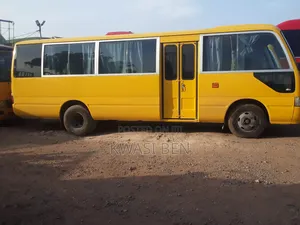 Toyota Coaster 2012 Yellow