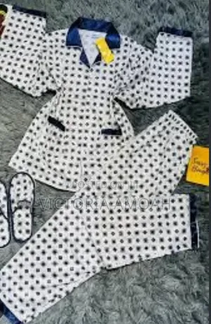 A Pyjamas Top Down With Attached Bedroom Slippers Set.
