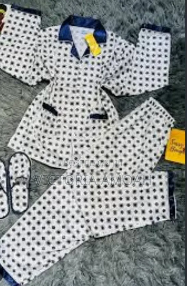 A Pyjamas Top Down With Attached Bedroom Slippers Set.