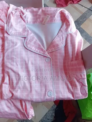 A Pink and White Striped Button-Down Pajama Set.