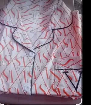 A Short-Sleeve Button-Down Pink Pajama.