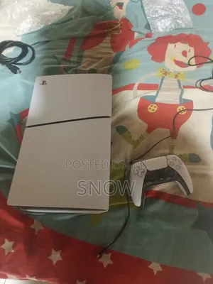 PS5 Slim With 2 Gamepads and FC 27