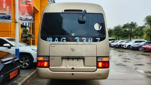 Toyota Coaster 2009 Gold