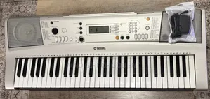 Yamaha Portatone PSR-E313 Portable 61-Key MIDI Electronic & Power Cord