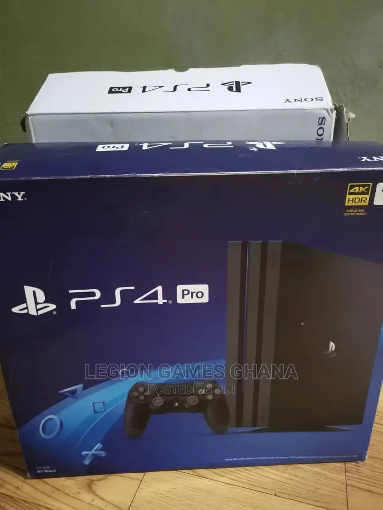 Playstation 4 Pro in Box With Games