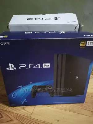 Playstation 4 Pro in Box With Games
