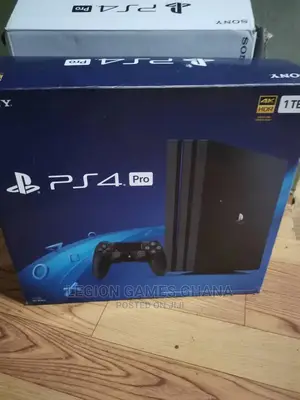 Playstation 4 Pro in Box With Games