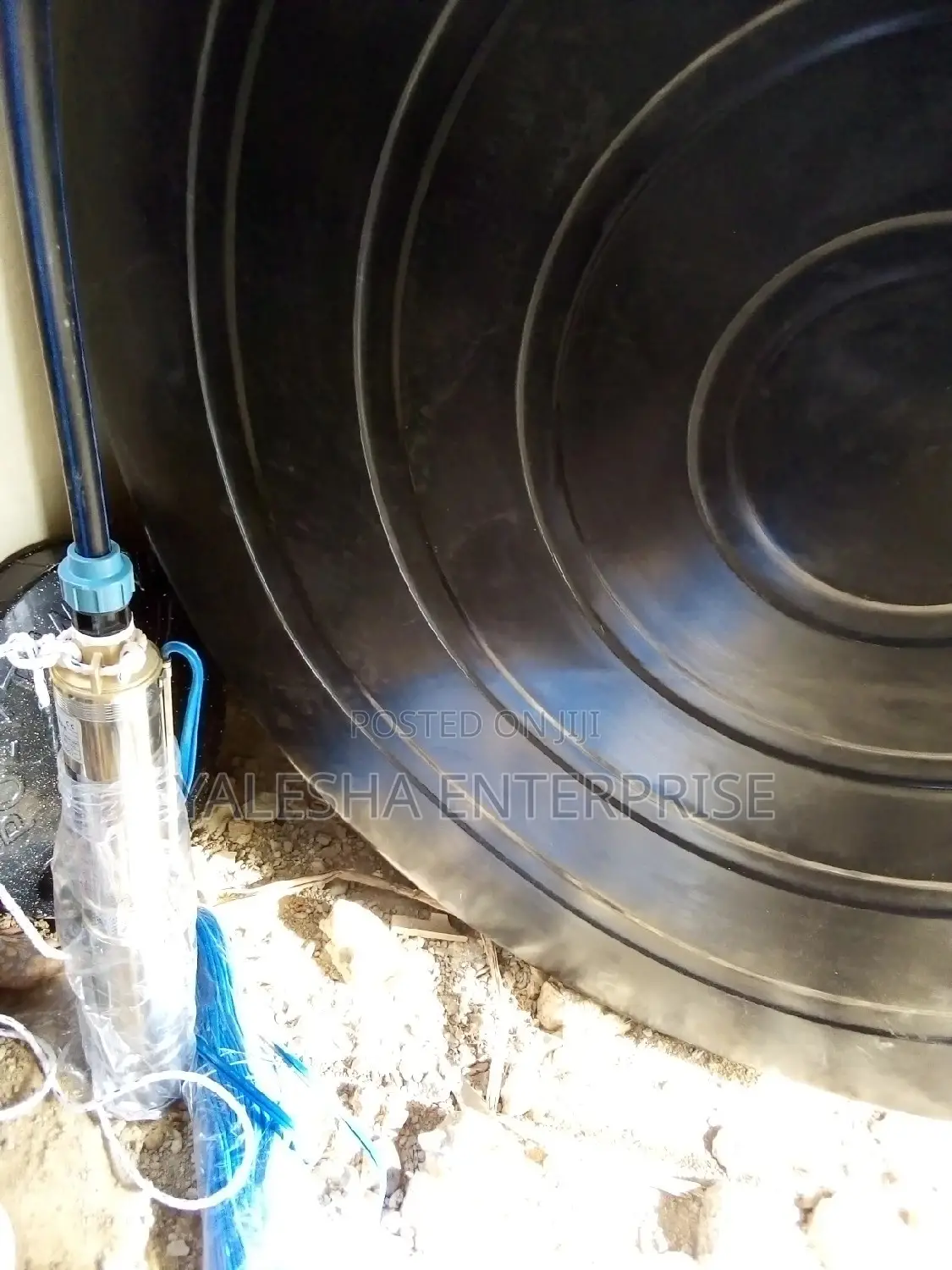 Borehole Drilling Services With Quality Pump and Blue Pipes