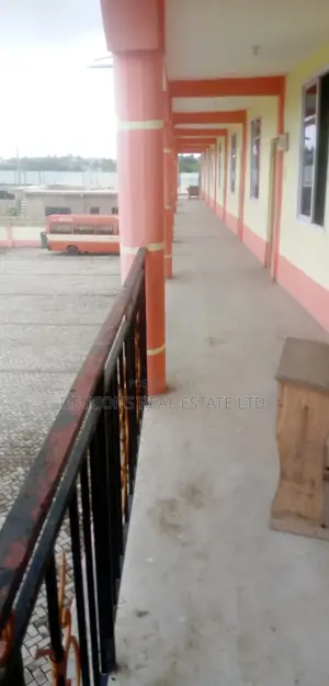 A Mega School Sited on 6 Plots of Land, Fenced for Sale