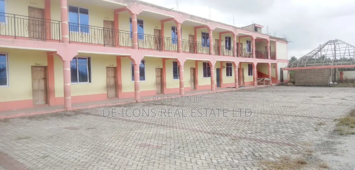 A Mega School Sited on 6 Plots of Land, Fenced for Sale